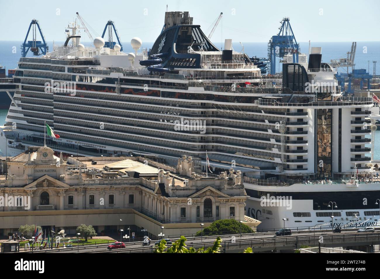 The port of Genoa is a place of great charm with large ships, containers, the Genoa Lantern, the Bigo, the Biosphere and Renzo Piano's Aquarium. Stock Photo