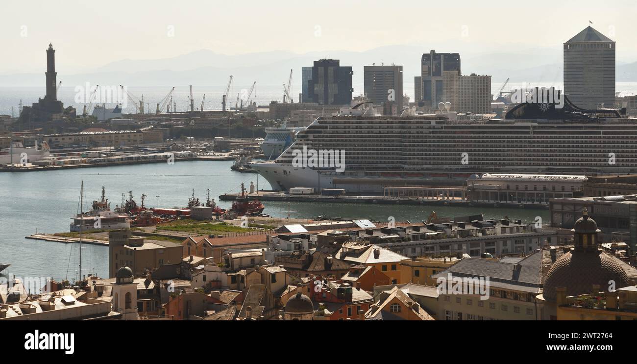 The port of Genoa is a place of great charm with large ships, containers, the Genoa Lantern, the Bigo, the Biosphere and Renzo Piano's Aquarium. Stock Photo