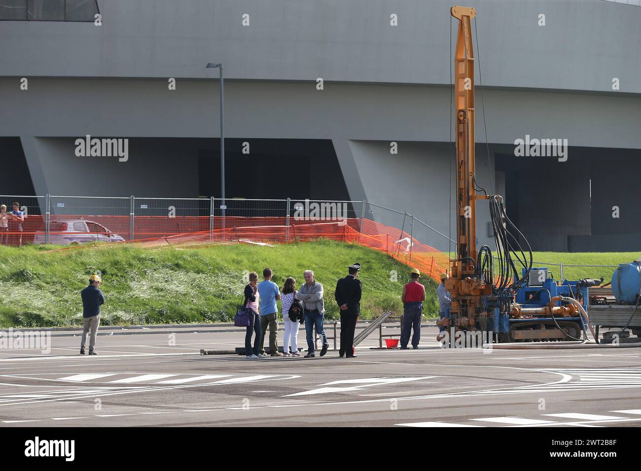 A drill in front of Afragola's high-speed rail station, TAV, and workers while drilling to look for toxic waste burial. On the spot there were also th Stock Photo