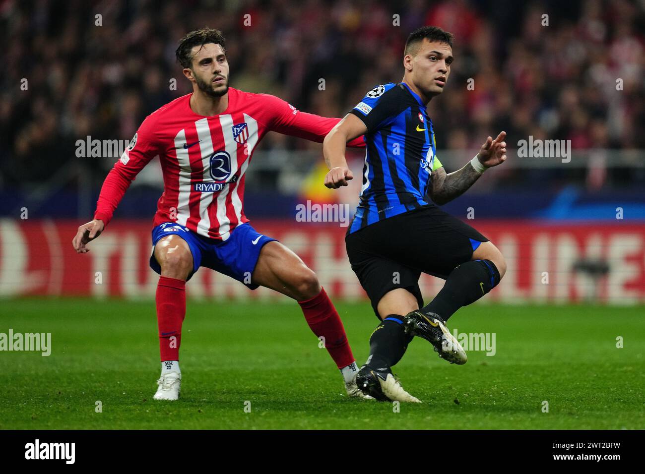 Madrid, Spain. 13th Mar, 2024. Mario Hermoso of Atletico de Madrid and Lautaro Martinez of Inter Milan during the UEFA Champions League match, Round of 16, second leg, between Atletico de Madrid and Inter Milan played at Civitas Metropolitano Stadium on March 13, 2024 in Madrid Spain. (Photo by Bagu Blanco/PRESSINPHOTO) Credit: PRESSINPHOTO SPORTS AGENCY/Alamy Live News Stock Photo