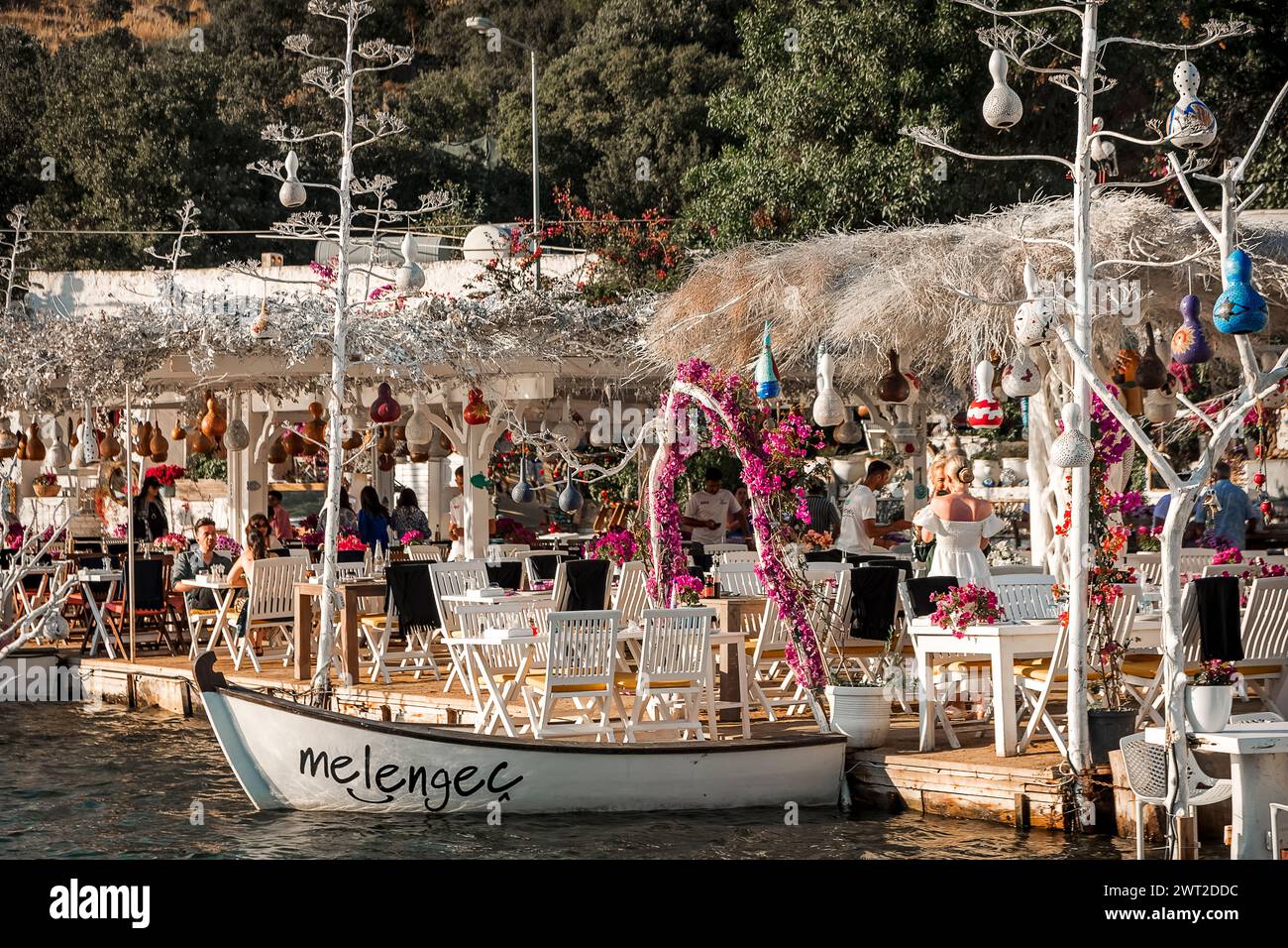 a typical seaside restaurant, with its famous artistic lanterns, in Gumusluk, a small fishing village a few miles from Bodrum Stock Photo