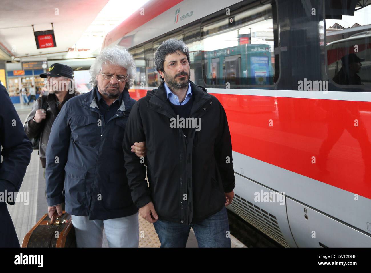 Roberto Fico and Beppe Grillo, leaders of the italian political Movement 5 Stars, in a train station in Naples Stock Photo