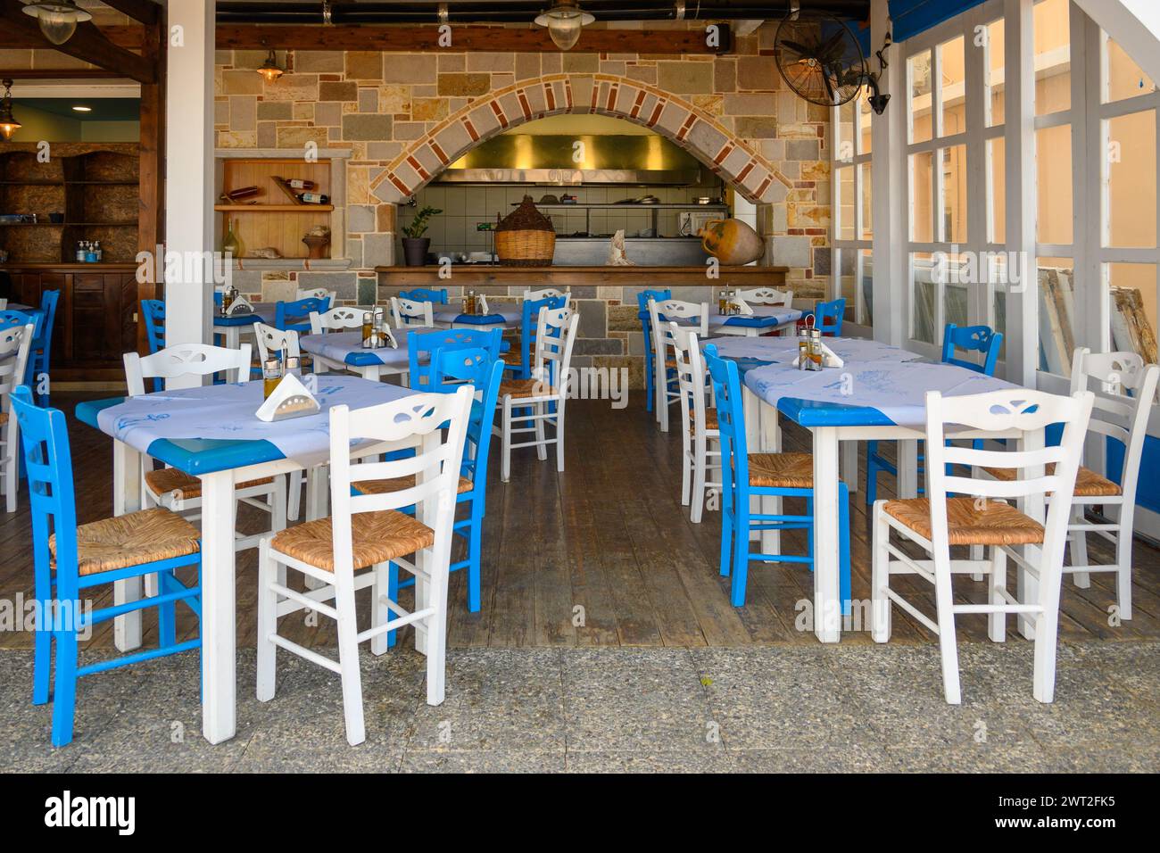 Kos, Greece - May 12, 2023: Greek seaside restaurant. Kardamena village on the island of Kos, Greece Stock Photo