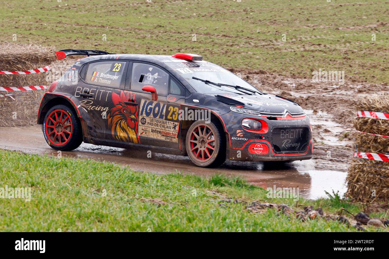 15 March 2024. St Denoeux, Pas de Calais, France. The 64th Rallye du Touquet roars along the Rue de Sempy between the towns of Sempy and St Denoeux in Stock Photo