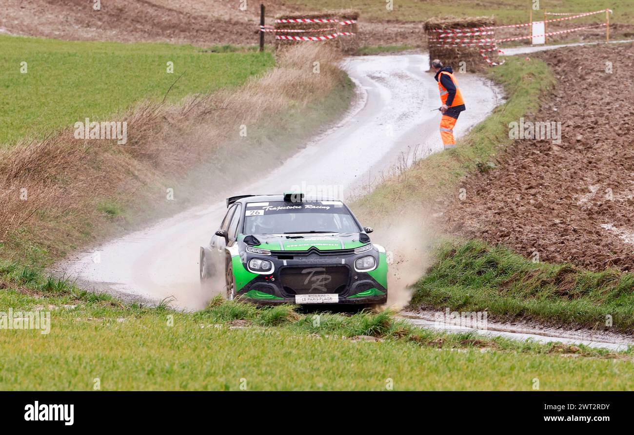 15 March 2024. St Denoeux, Pas de Calais, France. The 64th Rallye du Touquet roars along the Rue de Sempy between the towns of Sempy and St Denoeux in Stock Photo