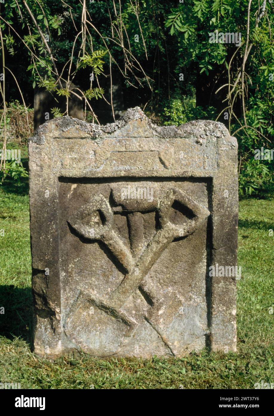 St Andrew's church, Hartburn, Morpeth, Northumberland. headstone of Thomas Chicken 1723. Tools