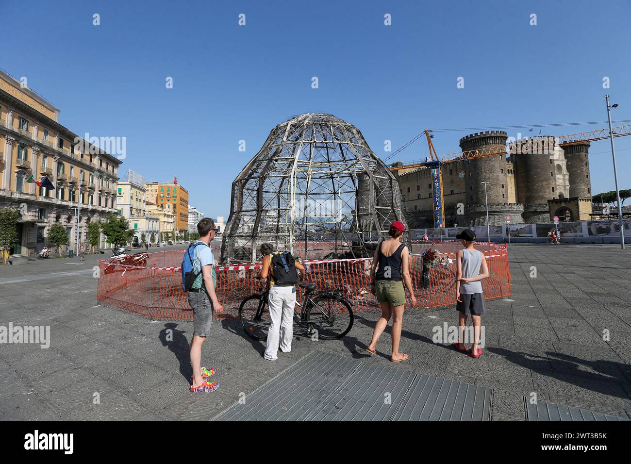 The structure of the giant Venus of the Rags by Michelangelo Pistoletto, completely burnt after unknown people set it on fire at dawn, in Municipio sq Stock Photo