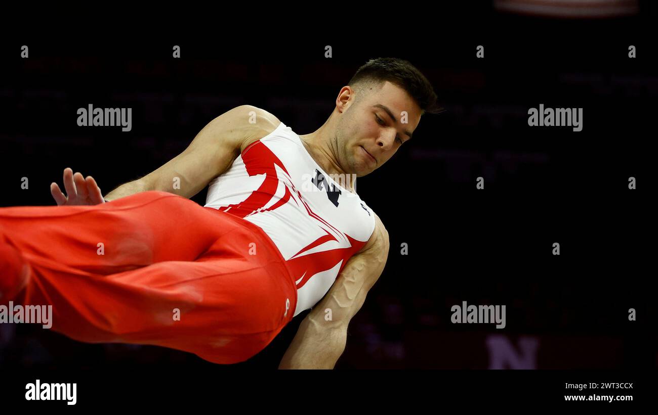 Nebraska's Cooper Giles performs on the pommel against Illinois during