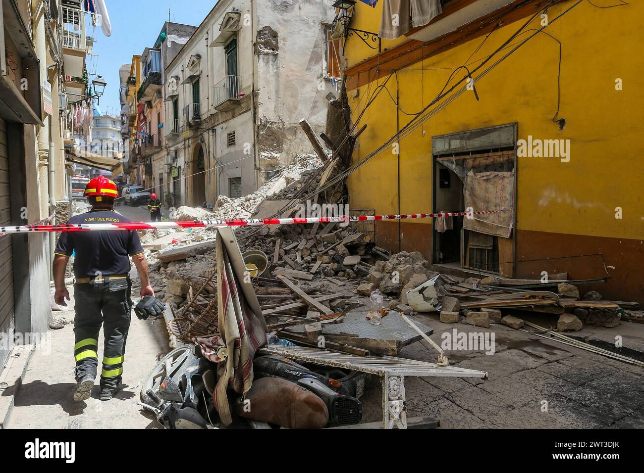 A view of the completely collapsed building in Torre del Greco, near Naples. Several people were injured and there are believed to be some dead. Firef Stock Photo