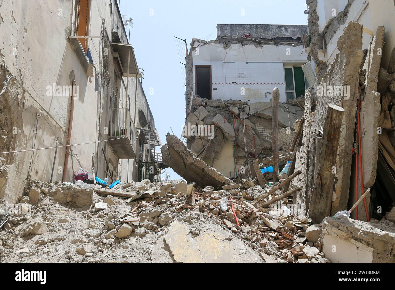 A view of the completely collapsed building in Torre del Greco, near Naples. Several people were injured and there are believed to be some dead. Firef Stock Photo