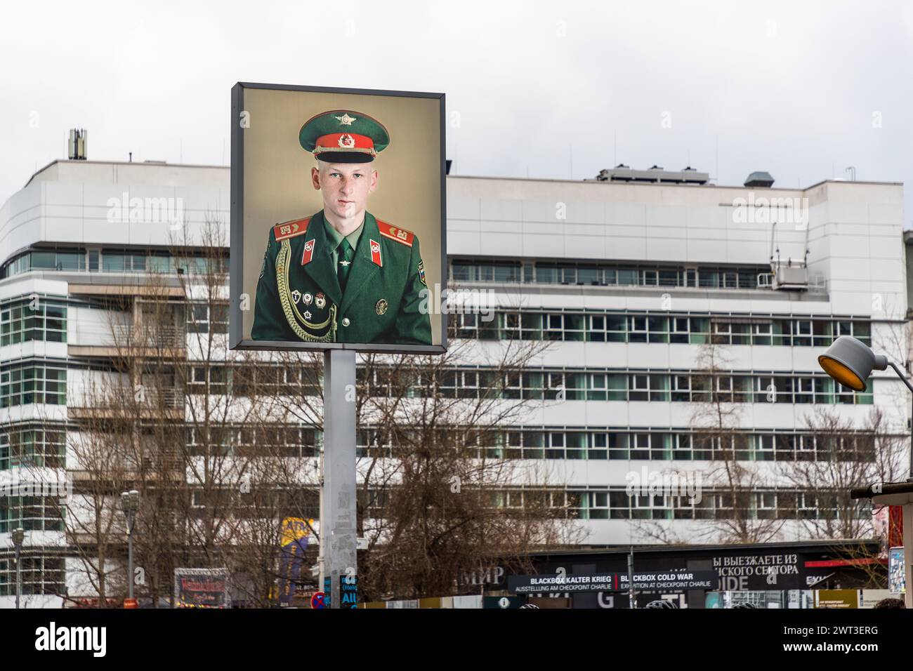There are many reminders of the Cold War and the divided city of Berlin at Checkpoint Charlie. Friedrichstraße, Berlin, Germany Stock Photo
