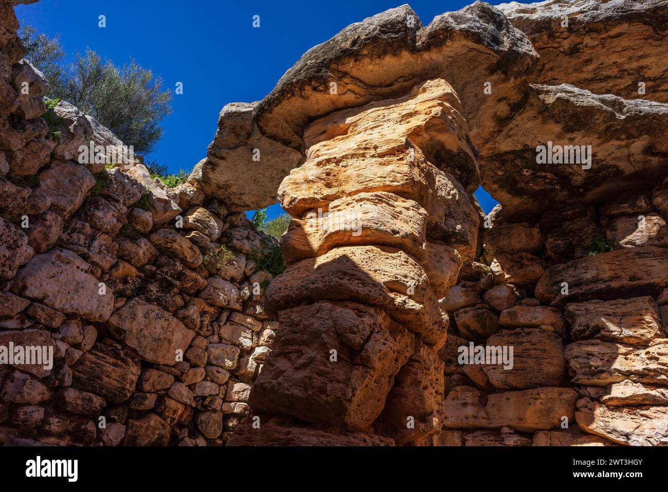 talaiot from the talaiotic era (Iron Age). Hospitalet Vell archeological site, Majorca, Balearic Islands, Spain Stock Photo