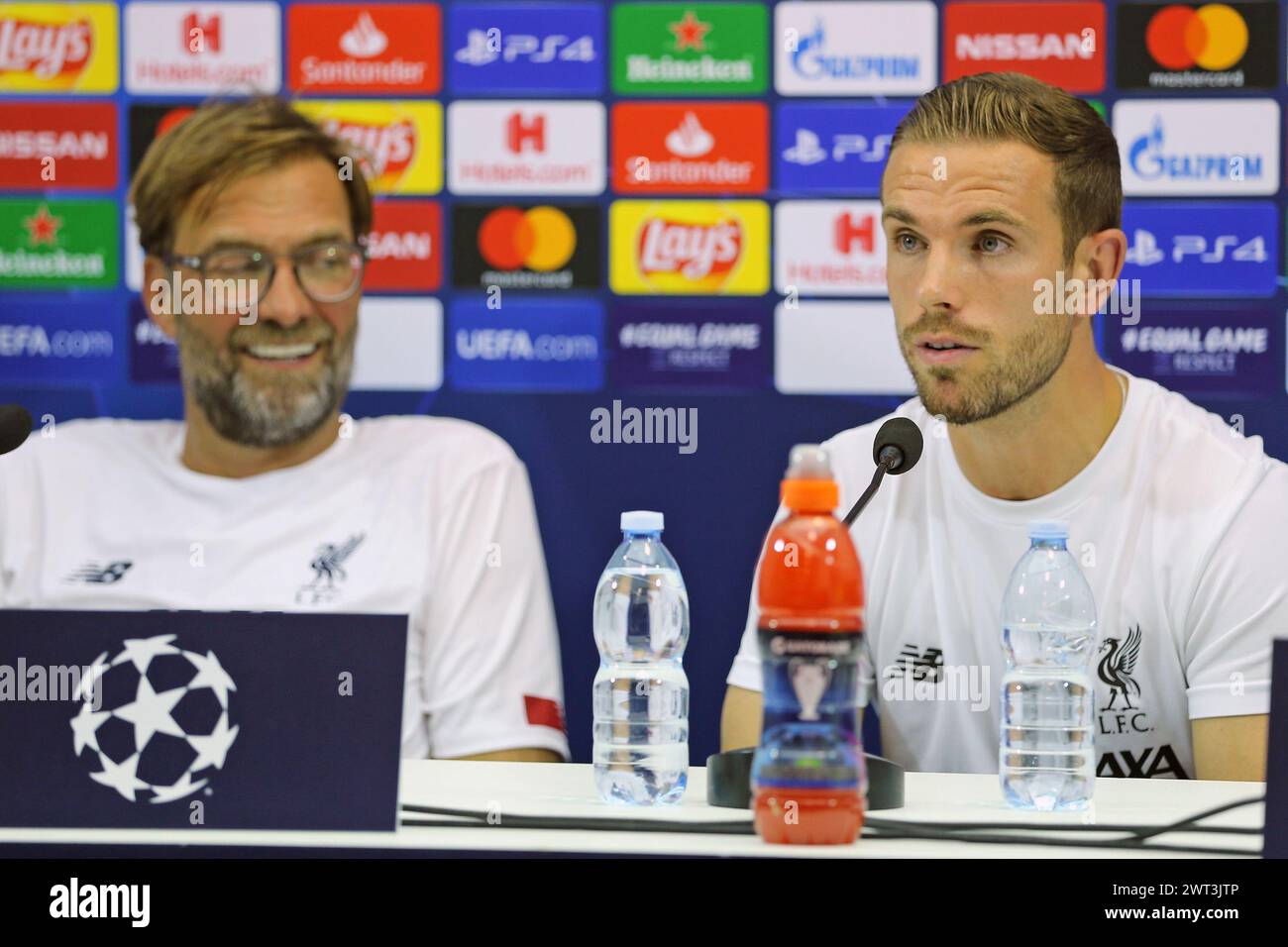 Liverpool coach, Jurgen Klopp, and Liverpool soccer player, Jordan Henderson, during the press conference at the San Paolo stadium, the day before the Stock Photo