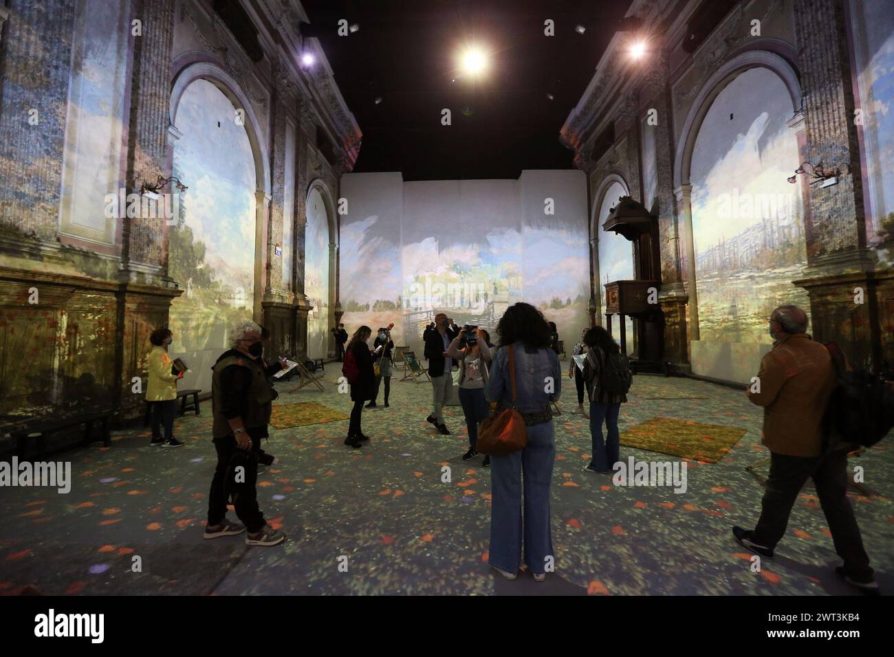 Claude Monet's paintings projected on the walls, inside the “Monet: The ...