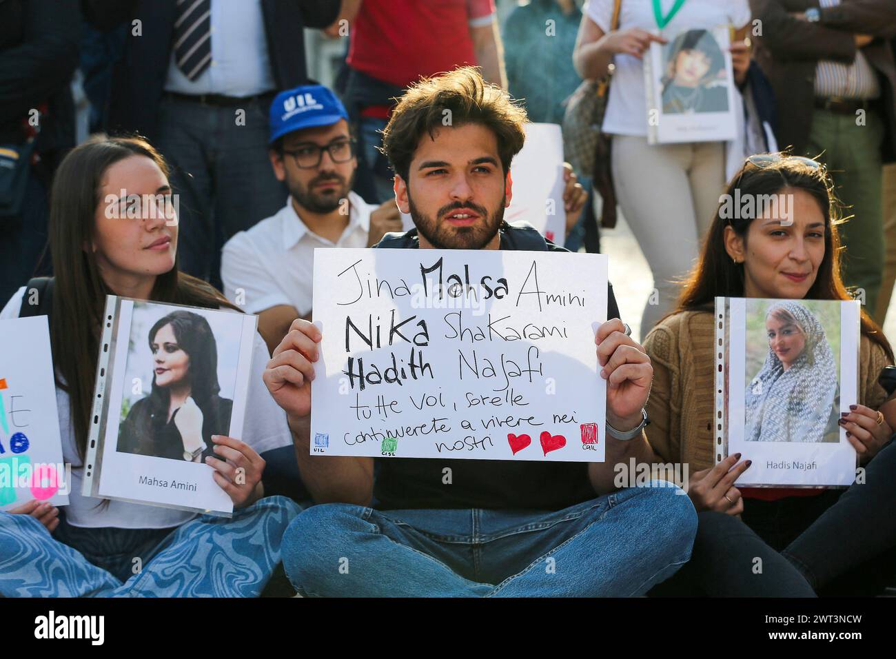 People with placards and photographs of Iranian women, during the ...