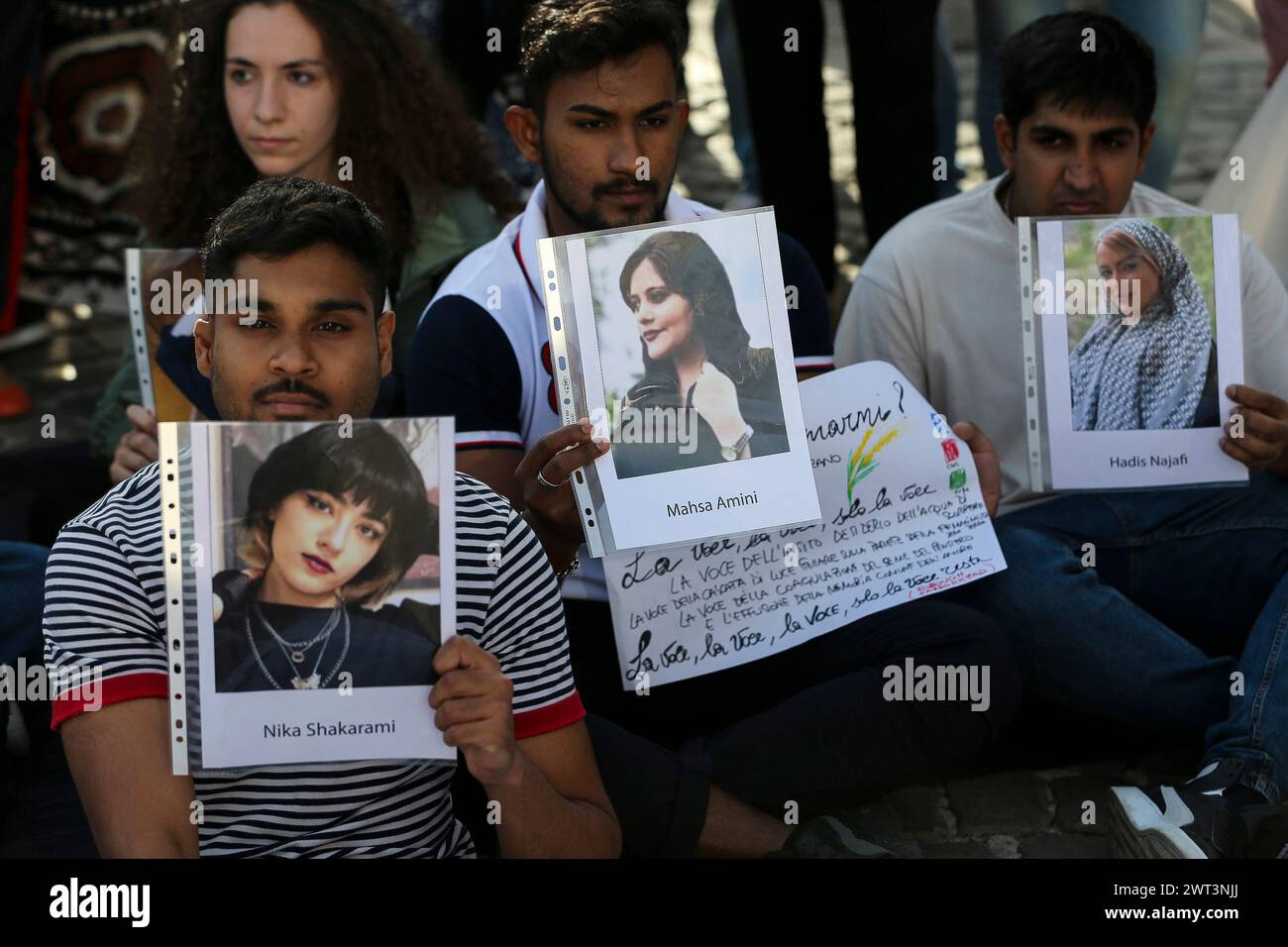 People with placards and photographs of Iranian women, during the ...