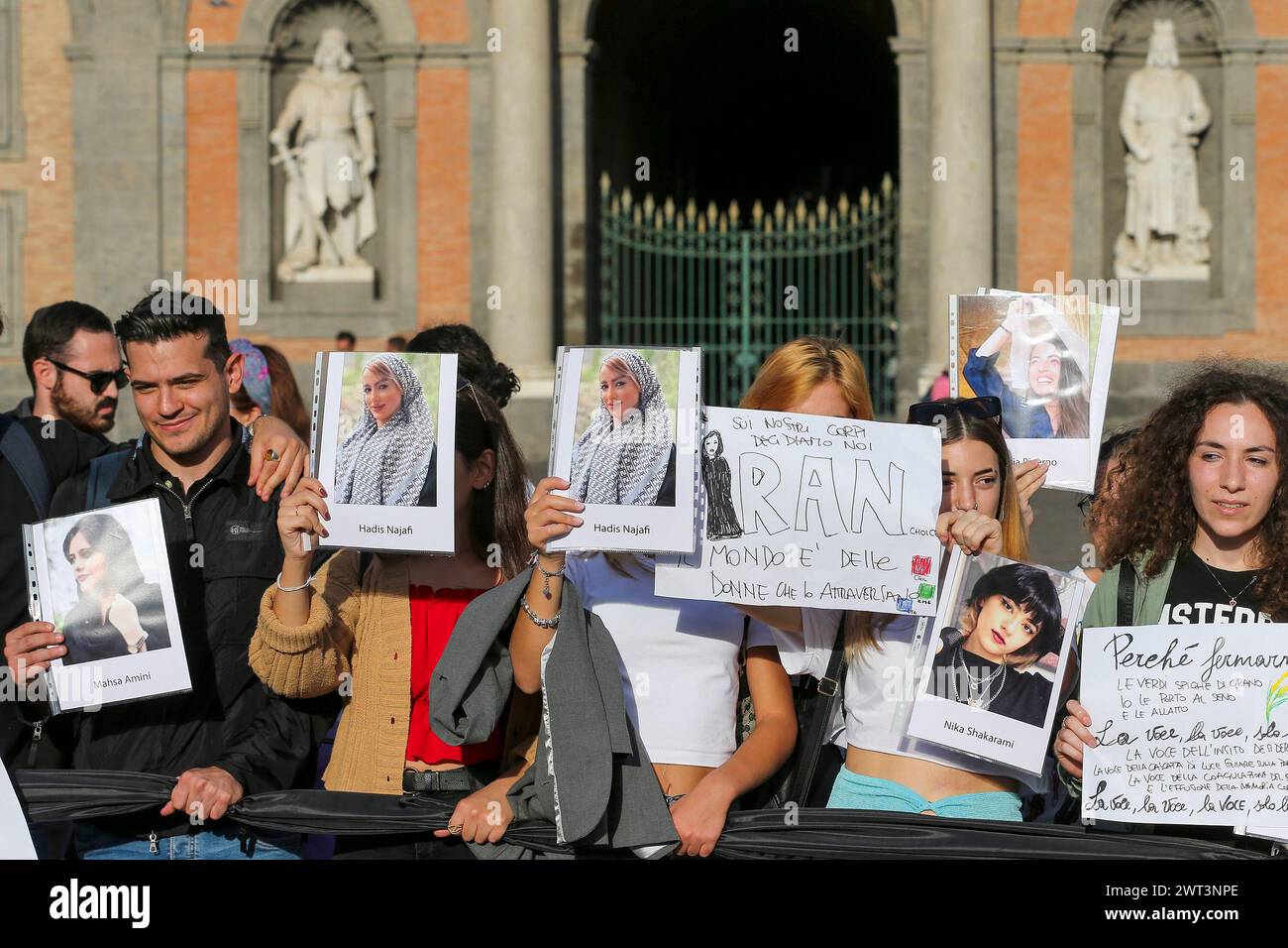 People with placards and photographs of Iranian women, during the ...