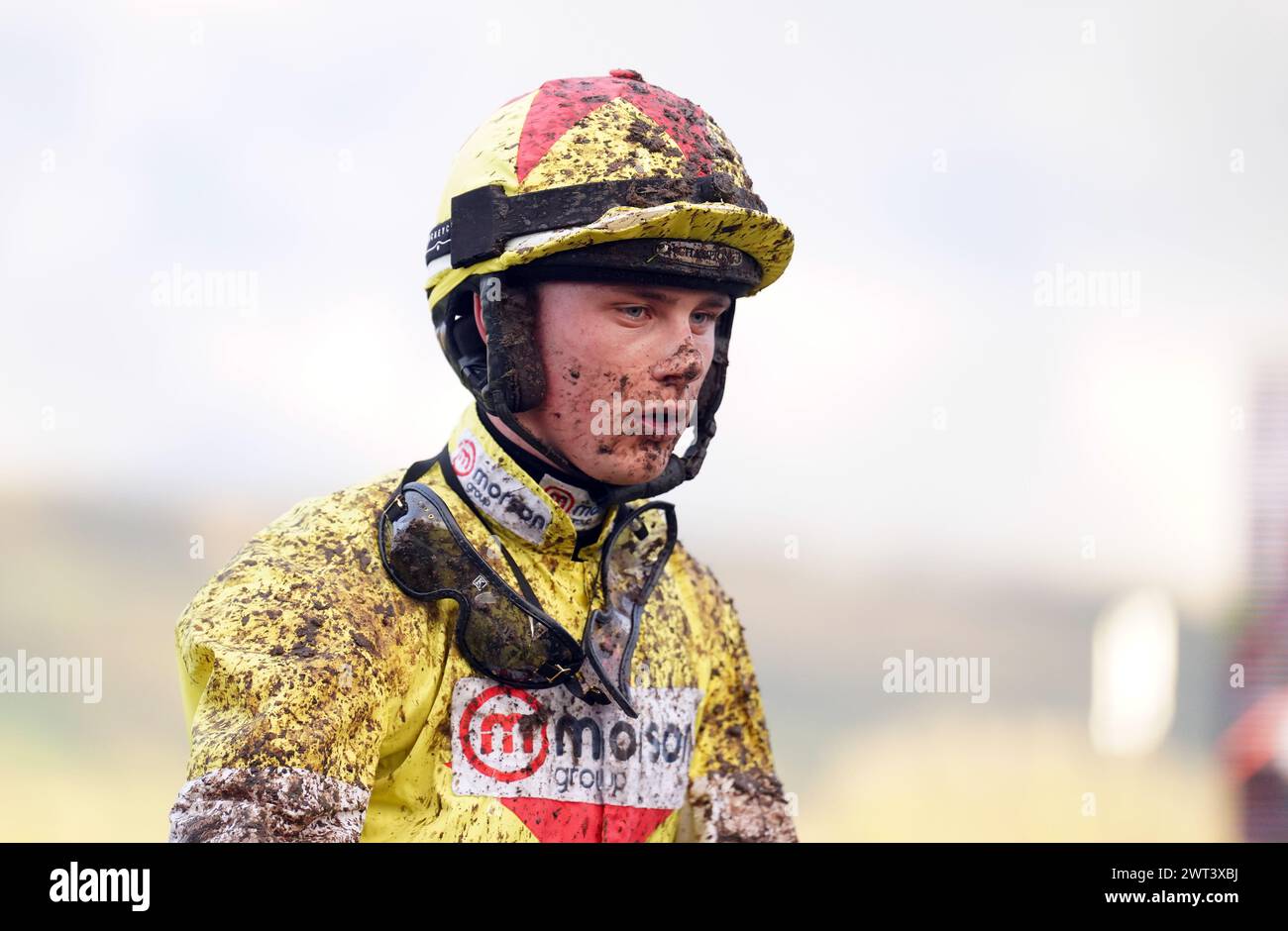 Freddie Gingell covered in mud following the Martin Pipe Conditional Jockeys' Handicap Hurdle on day four of the 2024 Cheltenham Festival at Cheltenham Racecourse. Picture date: Friday March 15, 2024. Stock Photo