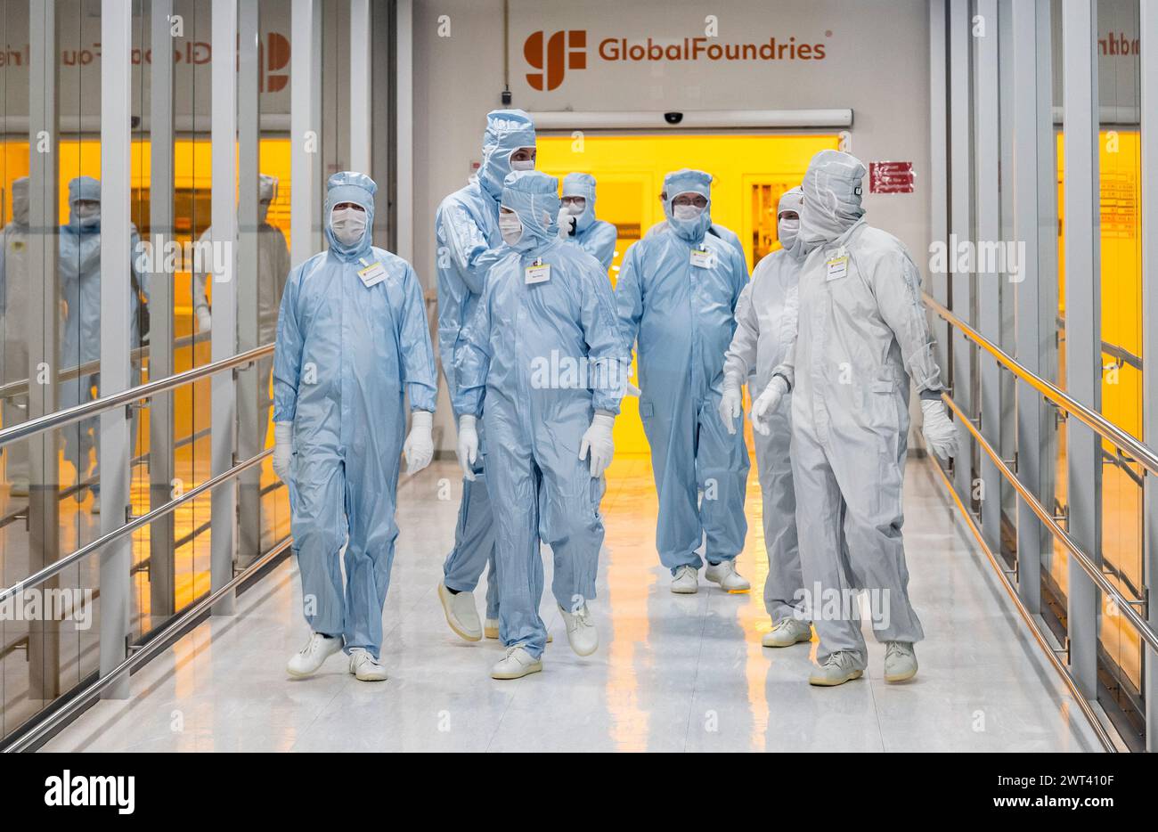 Drazdany, Germany. 15th Mar, 2024. Czech President Petr Pavel visited the GlobalFoundries microchip factory in Saxony, on March 15, 2024, in Dresden, Germany. From left: Saxony's Prime Minister Michael Kretschmer and President Petr Pavel touring the cleanroom. The 'cleanroom' is only accessible with anti-static suits and strict hygiene rules to prevent contamination of materials. Credit: Ondrej Hajek/CTK Photo/Alamy Live News Stock Photo