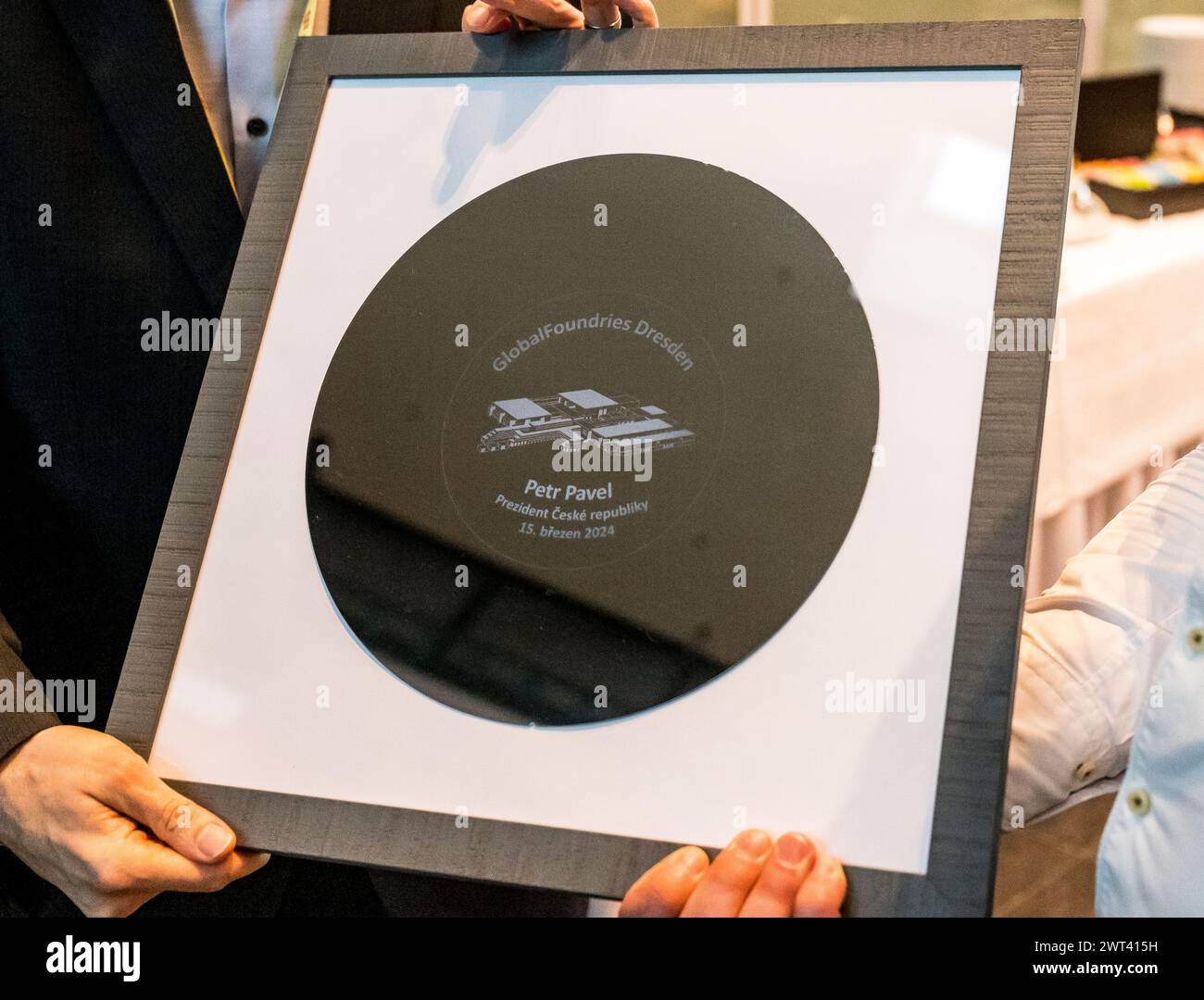 Drazdany, Germany. 15th Mar, 2024. Czech President Petr Pavel, not seen, visited the GlobalFoundries microchip factory in Saxony, on March 15, 2024, in Dresden, Germany. On the photo is seen a commemorative silicon plaque prepared for the President by Czech employees of the company. Credit: Ondrej Hajek/CTK Photo/Alamy Live News Stock Photo