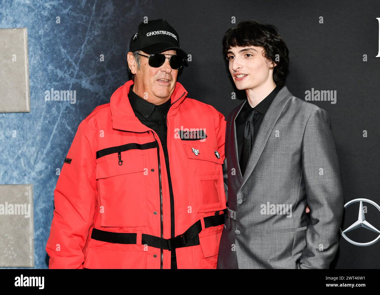 Dan Aykroyd, left, and Finn Wolfhard attend the premiere of