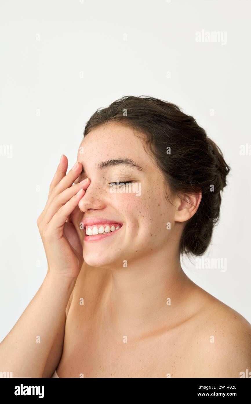 Beauty photo of happy young woman with freckles on face isolate on white. Stock Photo