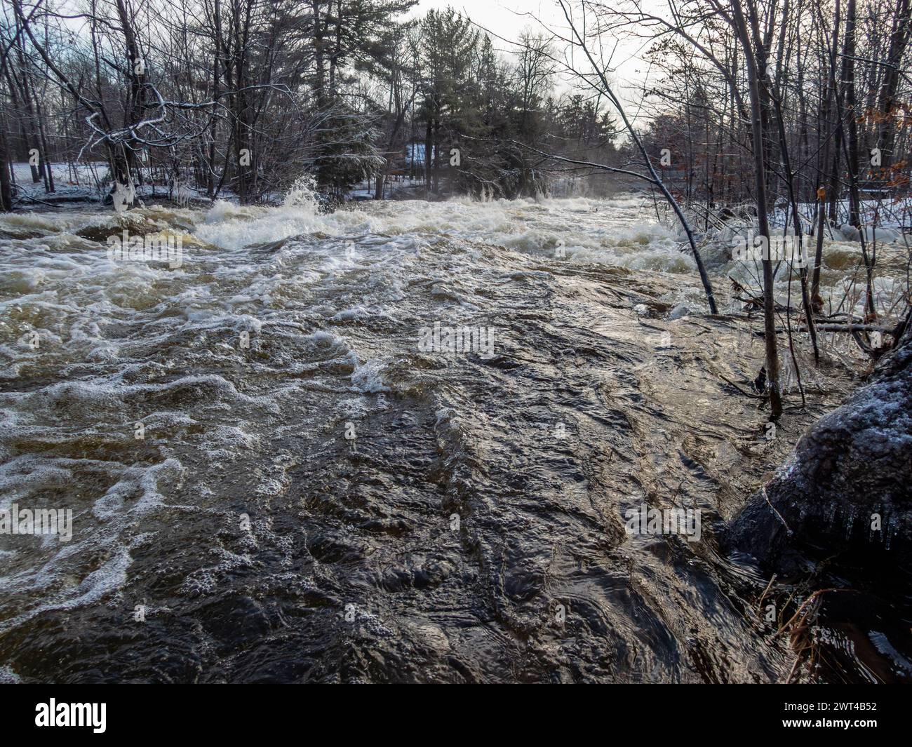 West River overflowing its banks at Brownsburg waterfall, Brownsburg-Chatham, Quebec, Canada Stock Photo