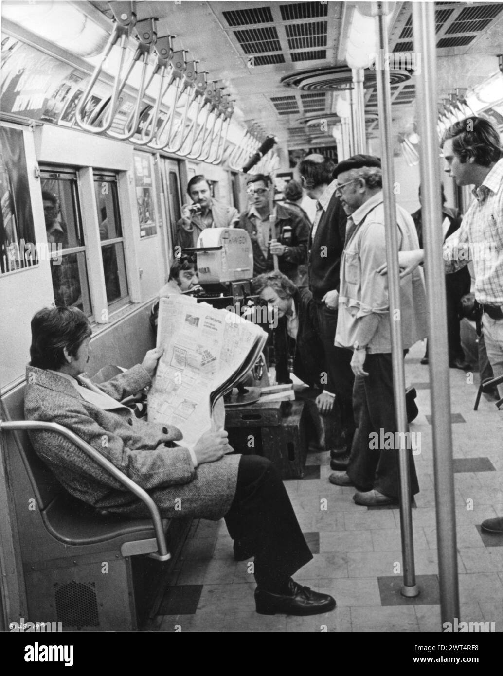 Director MICHAEL WINNER filming a scene with CHARLES BRONSON on the New York Subway for the film DEATH WISH 1974 Novel BRIAN GARFIELD Director of Photography ARTHUR J. ORNITZ Music HERBIE HANCOCK Dino De Laurentiis / Paramount Stock Photo