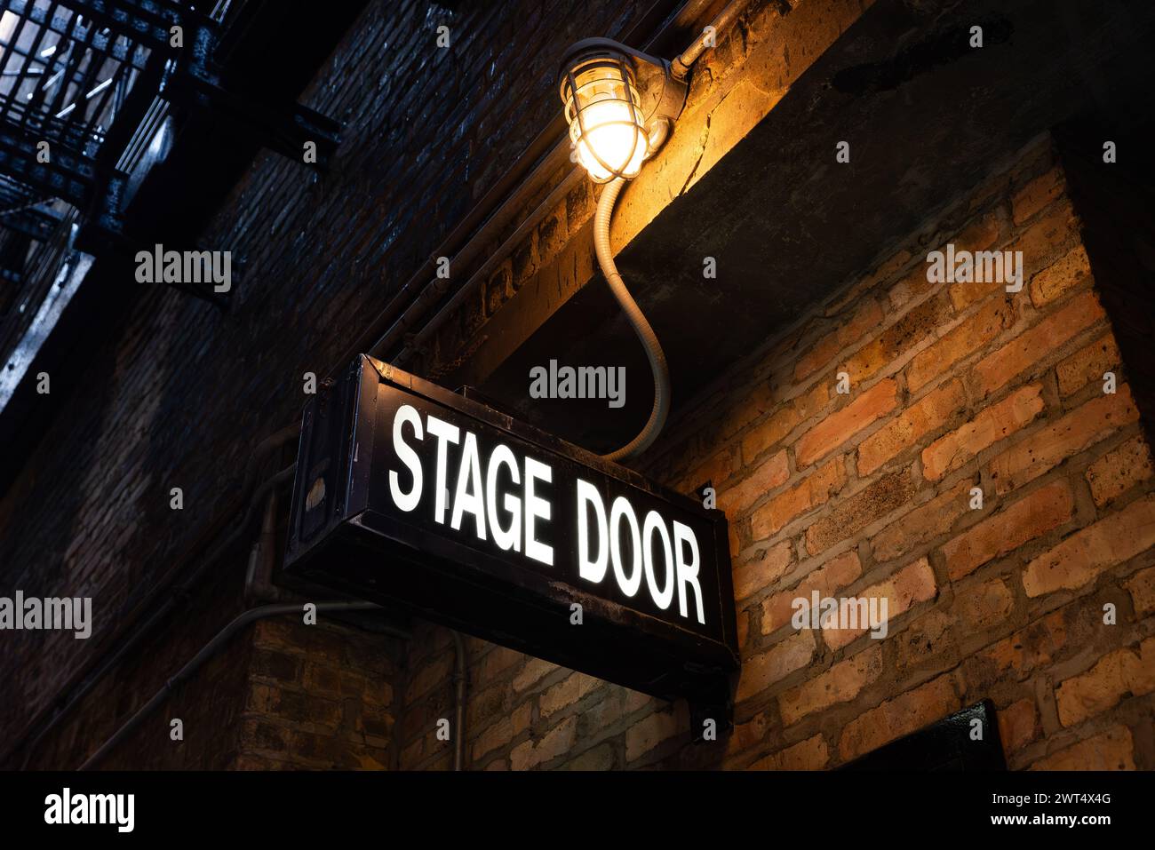 Stage door sign in downtown Chicago alley. Stock Photo