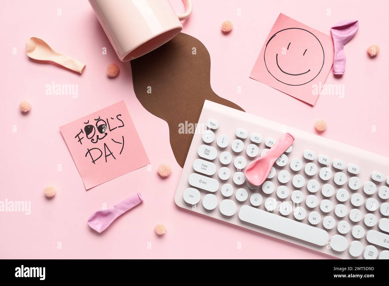 Computer keyboard, sticky notes and prank with spilled cup of coffee on