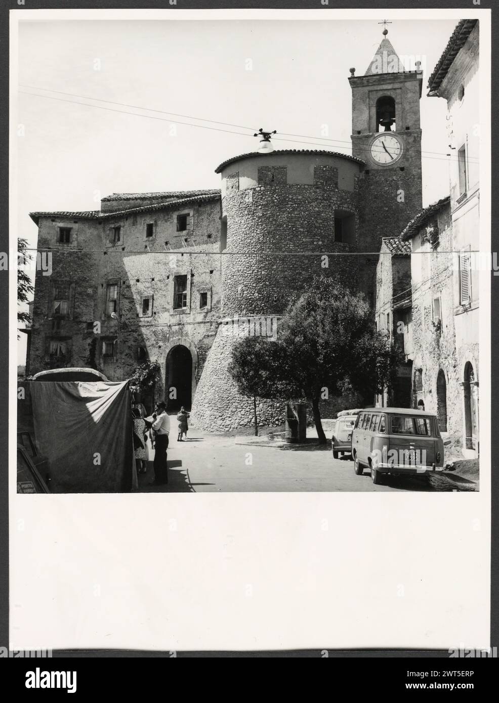 Lazio Rieti Torricella in Sabina Borgo Medievale. Hutzel, Max 1960-1990 Medieval: Architecture. The entrance to the medieval town opens upon a large circular tower dating to the 12th century, which formed a part of the castle of the Brancaleone. German-born photographer and scholar Max Hutzel (1911-1988) photographed in Italy from the early 1960s until his death. The result of this project, referred to by Hutzel as Foto Arte Minore, is thorough documentation of art historical development in Italy up to the 18th century, including objects of the Etruscans and the Romans, as well as early Mediev Stock Photo