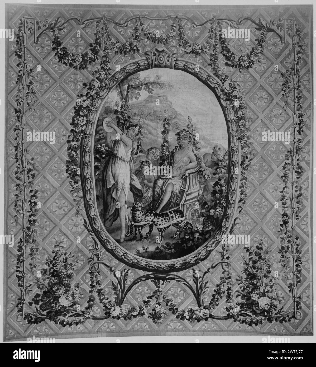 Triumph of Bacchus. Vien, Joseph Marie (the Elder) (French, 1716-1809) (designed after) [painter] c. 1770-1790 Tapestry Dimensions: H 7'4' x W 7' Tapestry Materials/Techniques: unknown Culture: French Weaving Center: Aubusson Ownership History: Jacques Seligmann & Co. sold to Mrs. Hubbard 9/4/1928. In medallion with laurel wreath frame (ALENTOUR) trellis ground with rosettes in lozenges, decorated with arabesque frame of garlands & festoons, bouquets of flowers & acanthus leaves The name 'E. Le Roux' appears on verso of GCPA 0240409. Jacques Seligmann & Co. stock sheet in archive, 11800 Relate Stock Photo