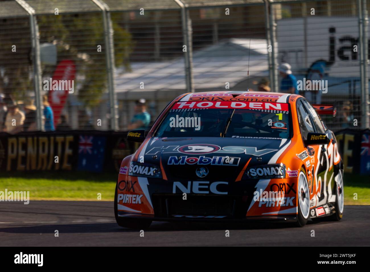 Adelaide, Australia. 16 March, 2024. The old Kelly Holden Commodore turns into the final corner on Saturday at the 2024 Repco Adelaide Motorsport Festival. Credit: James Forrester/Alamy Live News Stock Photo