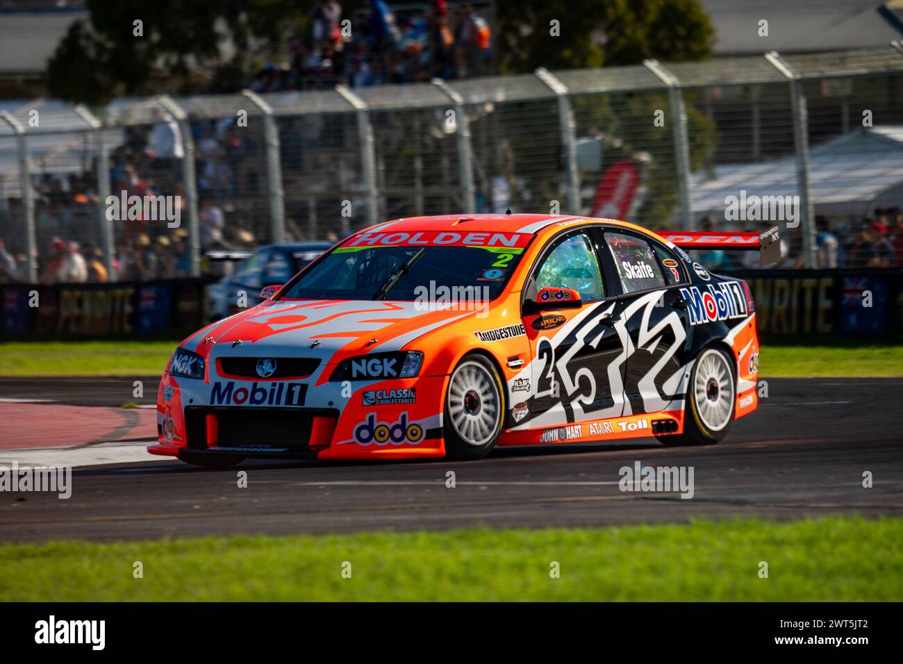 Adelaide, Australia. 16 March, 2024. Mark Skaife’s commodore turns through the final turn on Saturday at the 2024 Repco Adelaide Motorsport Festival. Credit: James Forrester/Alamy Live News Stock Photo