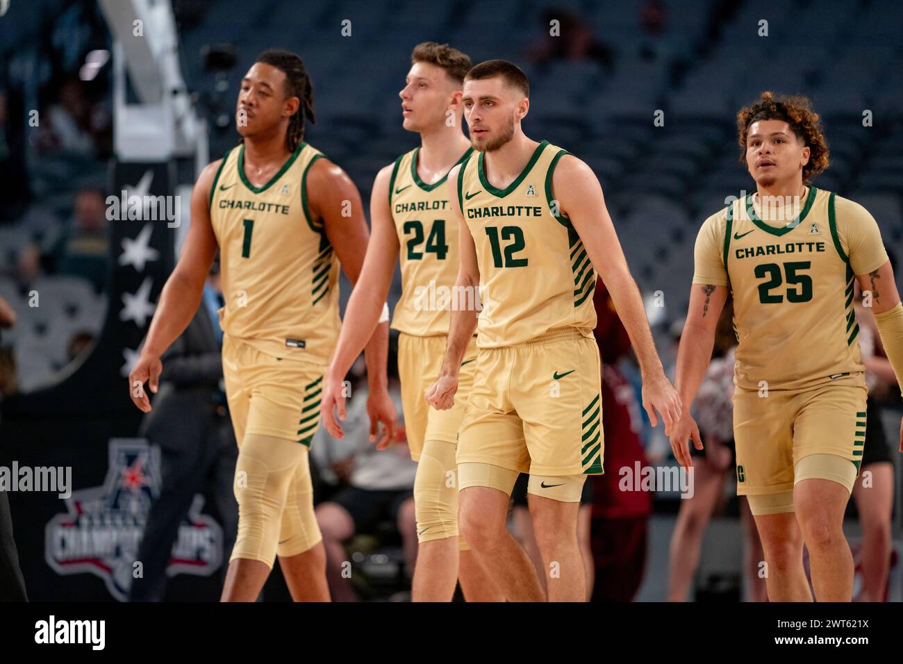 FORT WORTH, TX - MARCH 15: Charlotte 49ers players walk to the sideline ...