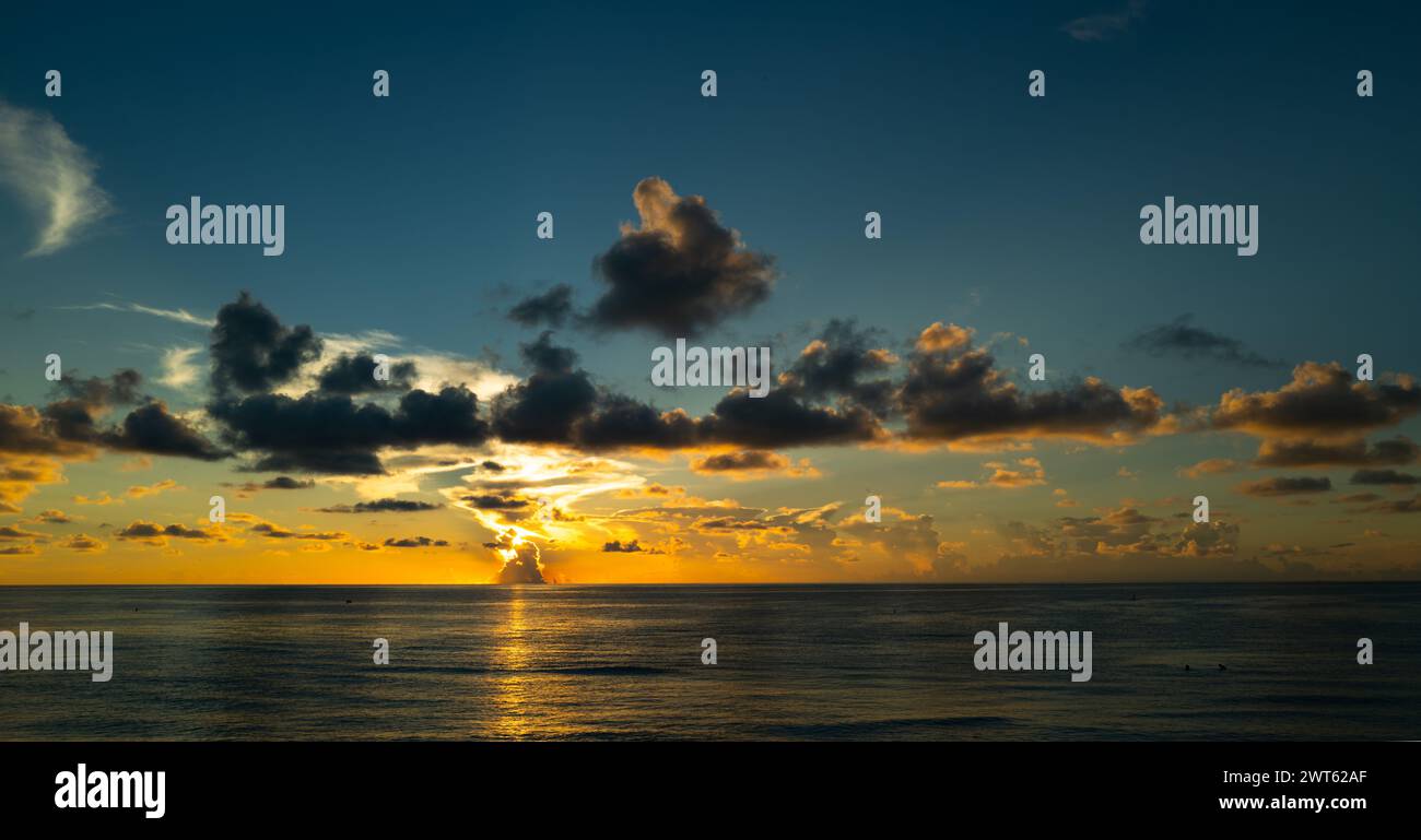 Dramatic sunset sky. sea. Calm sea with sunset sky through the clouds ...