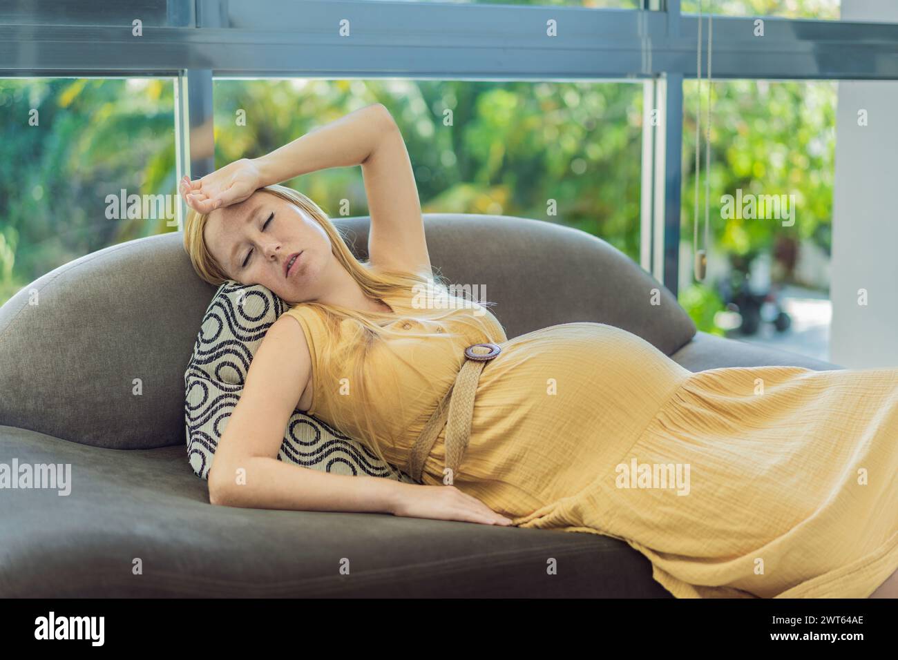 pregnant woman experiences a fainting spell, highlighting the