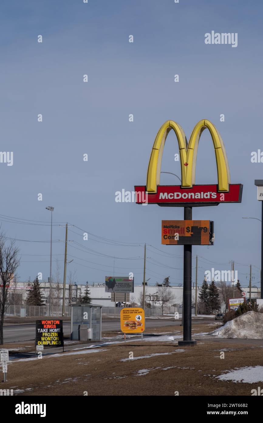 March 10 2024 Calgary Alberta Canada McDonald's Golden Arch Sign advertising meals Stock