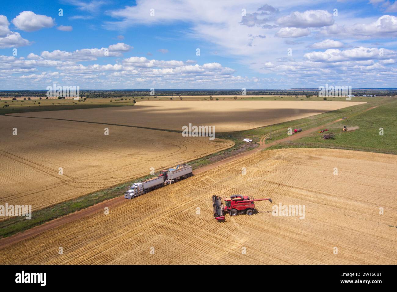 Aerial of roadtrain truck collecting harvested wheat for transport to Wallumbilla on the Maranoa Queensland Australia Stock Photo