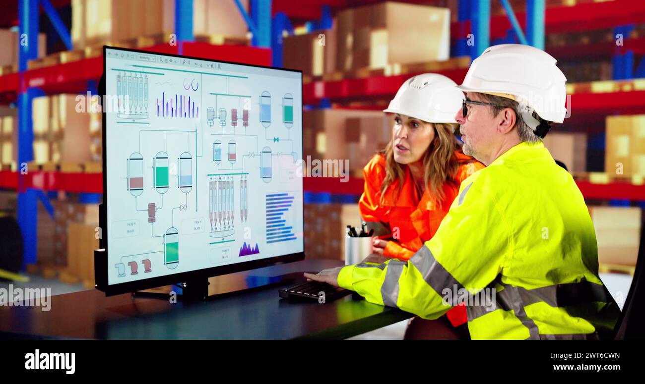 Warehouse Inventory Management On Office Computer. Supplier And Distribution Software Stock Photo