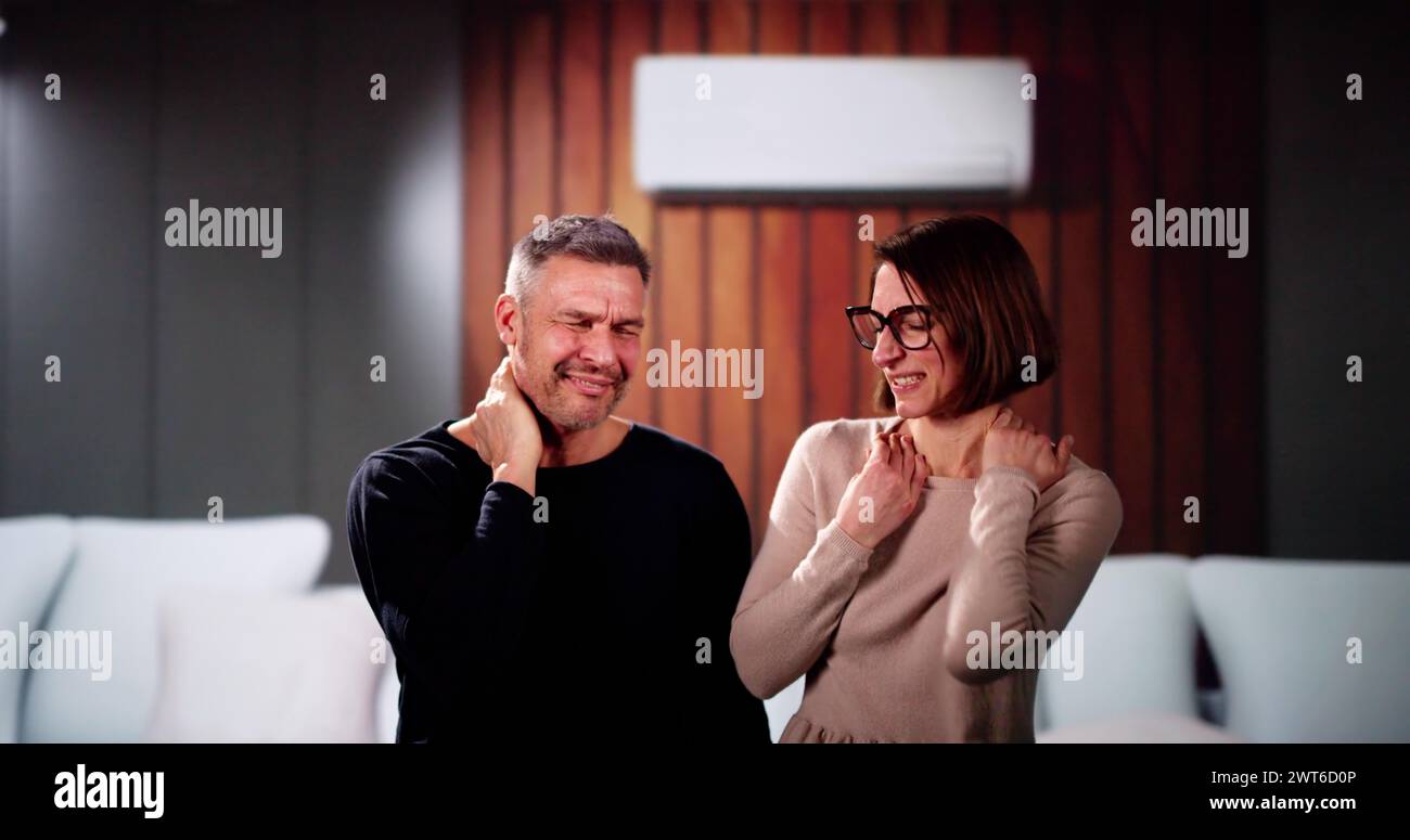 Sick Couple Having Cold And Sore Throat From Air Conditioner Stock