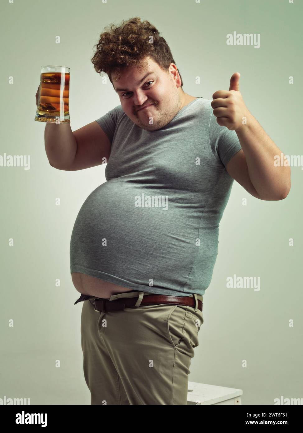 Plus size, portrait and thumbs up from man with beer for unhealthy ...