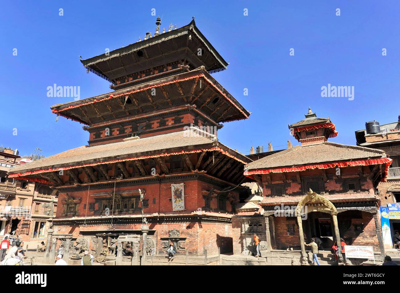 View of a historic temple with complex architecture on a busy square ...