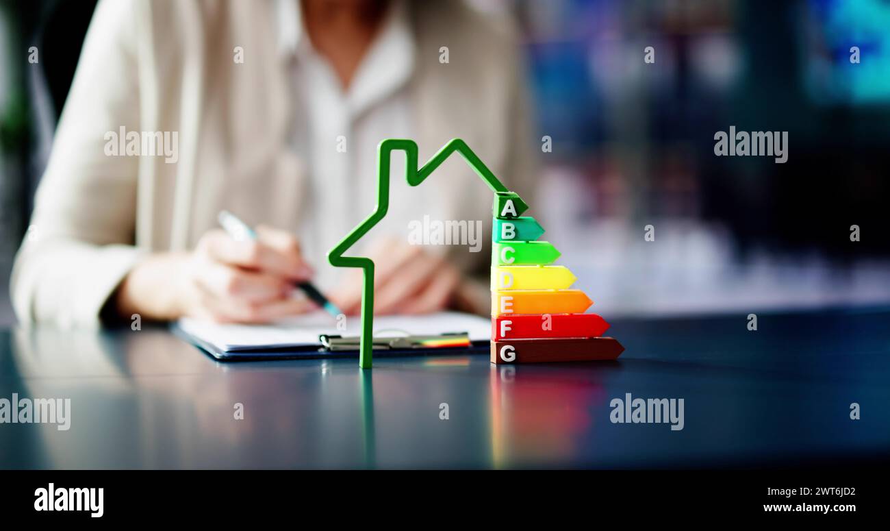 Energy Efficient House Audit Using Calculator. High Efficiency Stock Photo