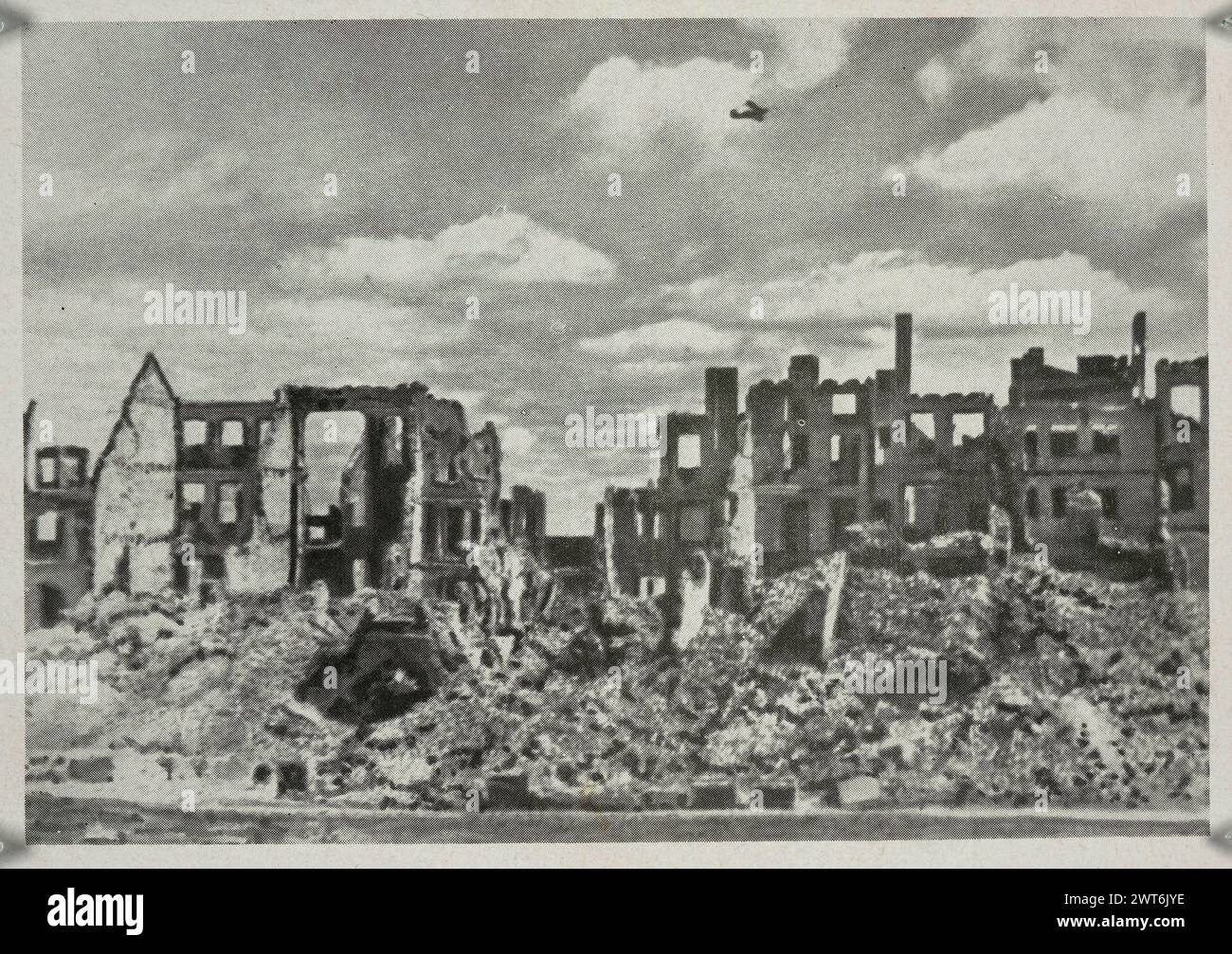 Vintage 1945 black and white postcard showing the destruction of Warsaw, Poland, during World War II, the Old Market ruins Stock Photo