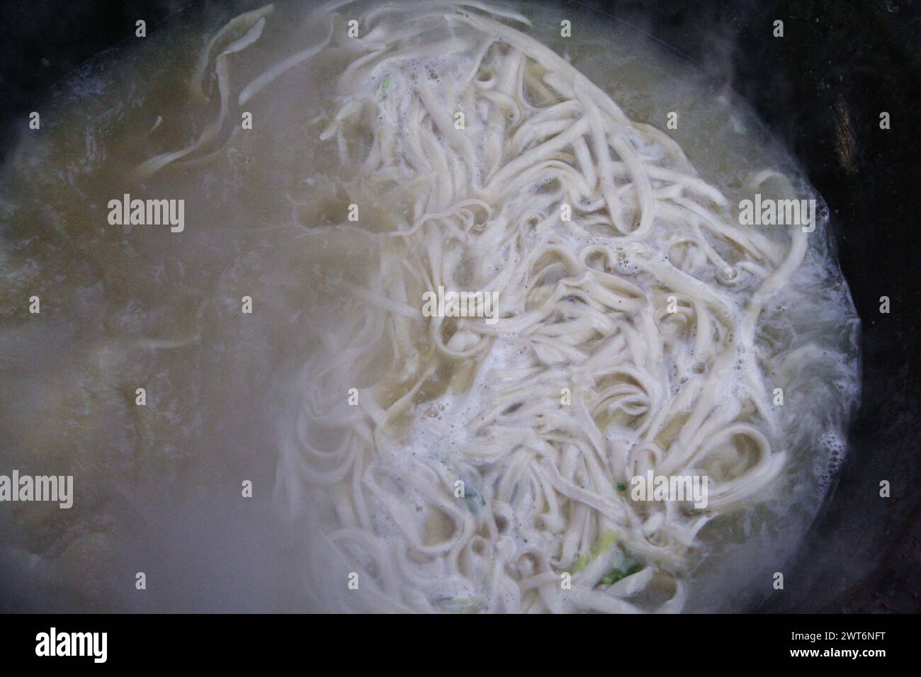 Cooking noodles, Shaanxi Province, China Stock Photo