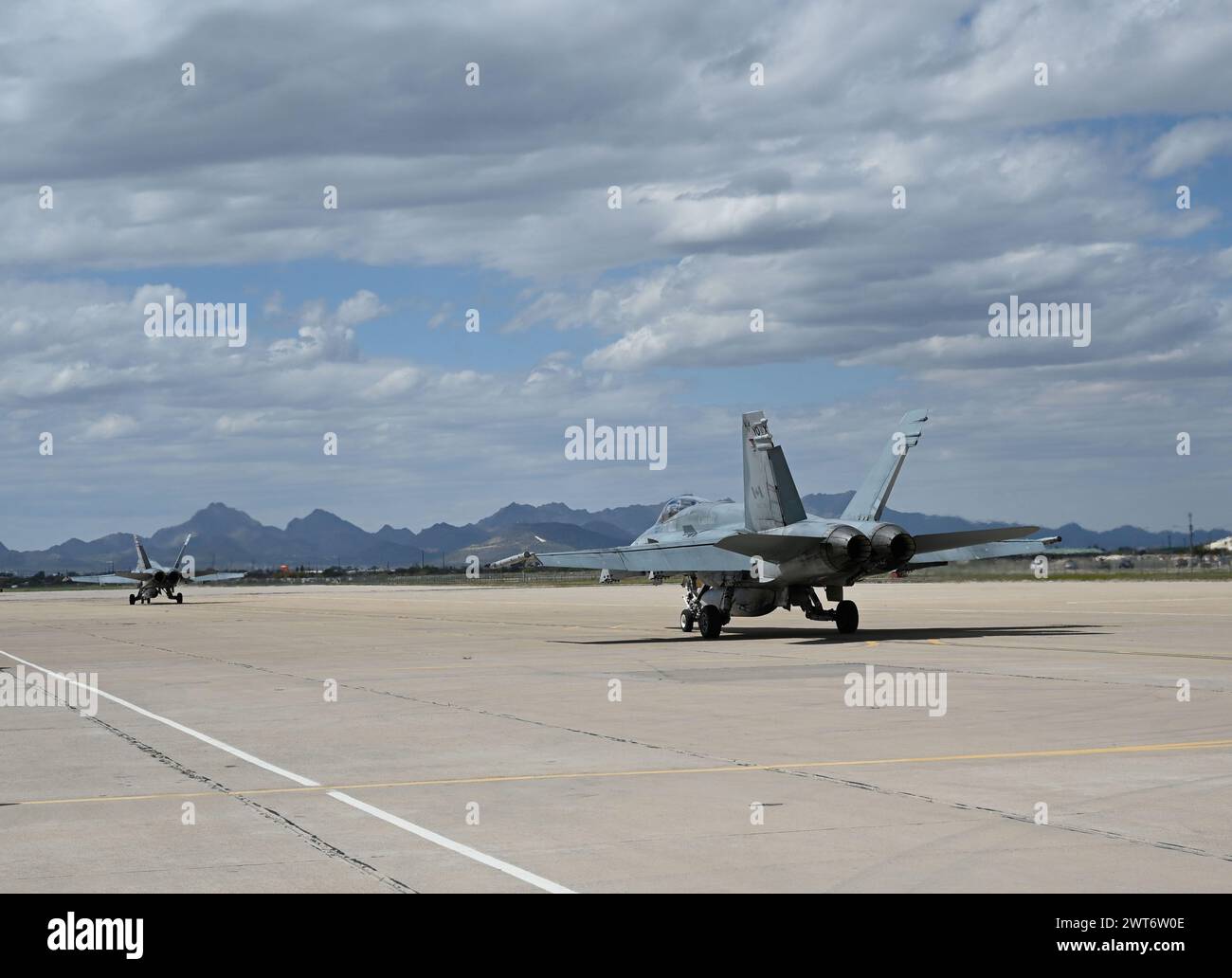 Two Royal Canadian Air Force CF-18 Hornet aircraft assigned to the 425th Tactical Fighter Squadron taxi for takeoff at Davis-Monthan Air Force Base Stock Photo