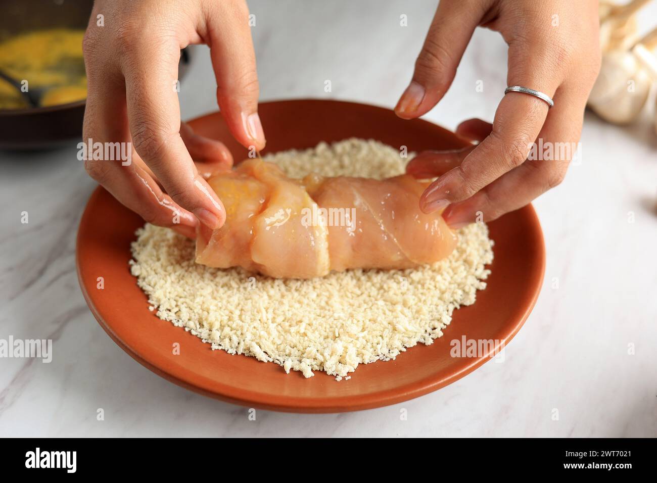 Preparing Meals, Coating Chicken with Bread Crumbs. Cooking Step by