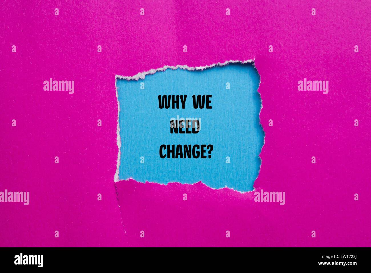 Why we need change words written on pink torn paper with blue background. Conceptual symbol. Copy space. Stock Photo