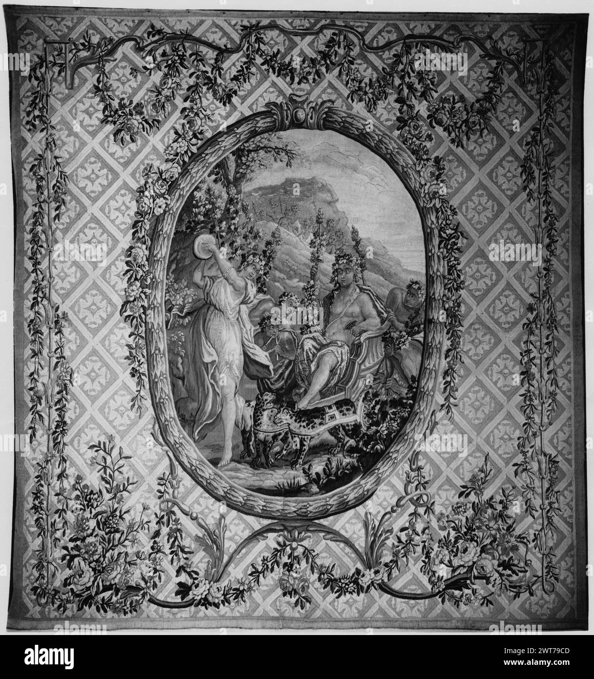 Triumph of Bacchus. Vien, Joseph Marie (the Elder) (French, 1716-1809) (designed after) [painter] c. 1770-1790 Tapestry Dimensions: H 7'4' x W 7'3' Tapestry Materials/Techniques: unknown Culture: French Weaving Center: Aubusson Ownership History: Jacques Seligmann & Co. In medallion framed by laurel-wreath frame (ALENTOUR) trellis ground with rosettes in lozenge openings, decorated with delicate garlands The name 'E. Le Roux' appears on verso. Related Works: Compositionally similar tapestry: GCPA 0240413 Stock Photo